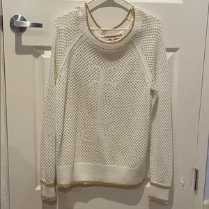 Juicy couture white sweater with gold lining.